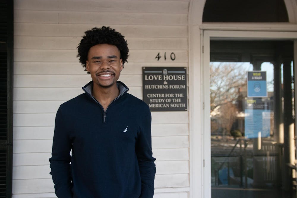 <p>UNC sophomore Shamar Wilson poses for a portrait on Tuesday, Jan. 18, 2022, outside The Love House and Hutchins Forum in Chapel Hill. Wilson is an intern for The Southern Oral History Program, a program dedicated to collecting interviews from Southerners for archival purposes.</p>