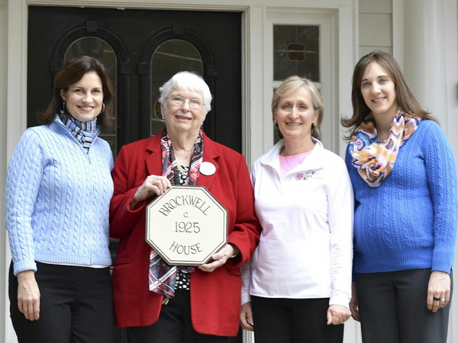 UNCDebra Pickrel, alumna chair and president of Gamma Lambda Chapter Association, Nanette Fields, first house corporation director, Karen Dias, house corporation board member and Cheri Szcodronski, Executive Director of Preservation Chapel Hill pose with the award after the Phi Mu 50th Anniversary brunch Sunday.Debra Pickrel, alumna chair and president of Gamma Lambda Chapter Association, Nanette Fields, first house corporation director, Karen Dias, house corporation board member and Cheri Szcodronski, Executive Director of Preservation Chapel Hill pose with the Brockwell plaque award for preservation after the Phi Mu 50th Anniversary brunch Sunday.