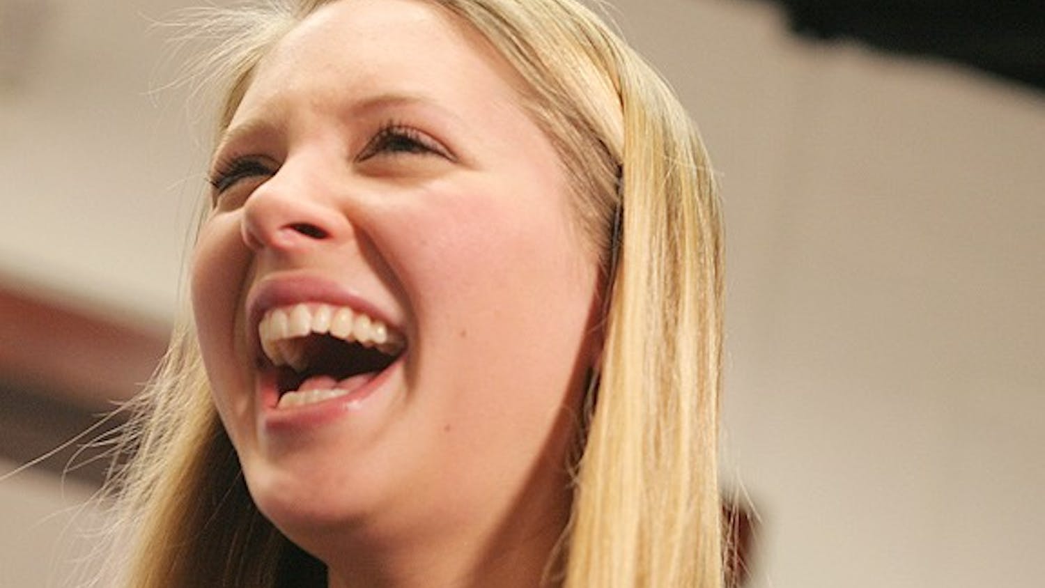 Eve Carson, the 2008 UNC Student Body President, laughs in a photo.