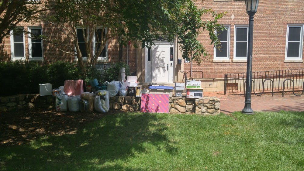 <p>Dorm decor stacks up outside as students move in.&nbsp;</p>