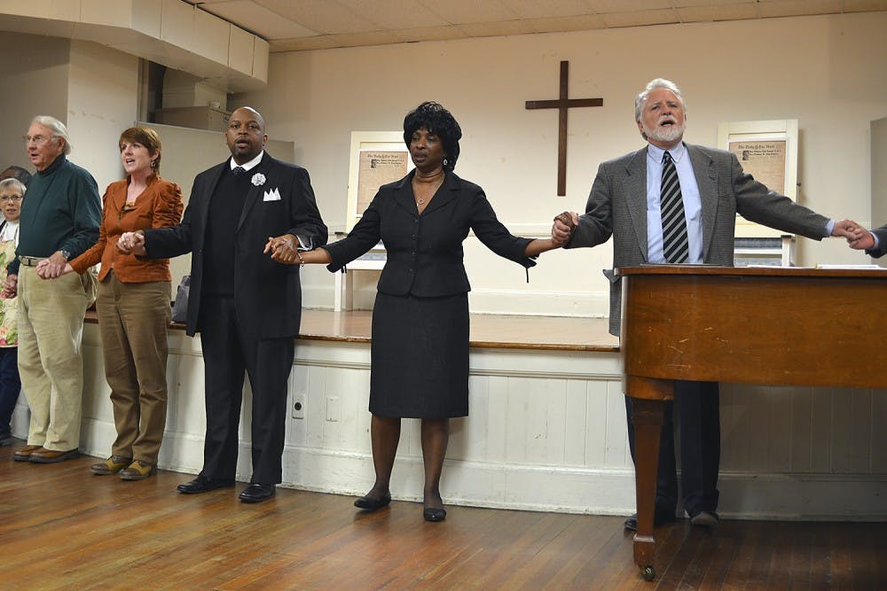 Community members gather in Chapel Hill’s University Baptist Church to honor Martin Luther King Jr., who gave a speech in the same room on May 8, 1960.