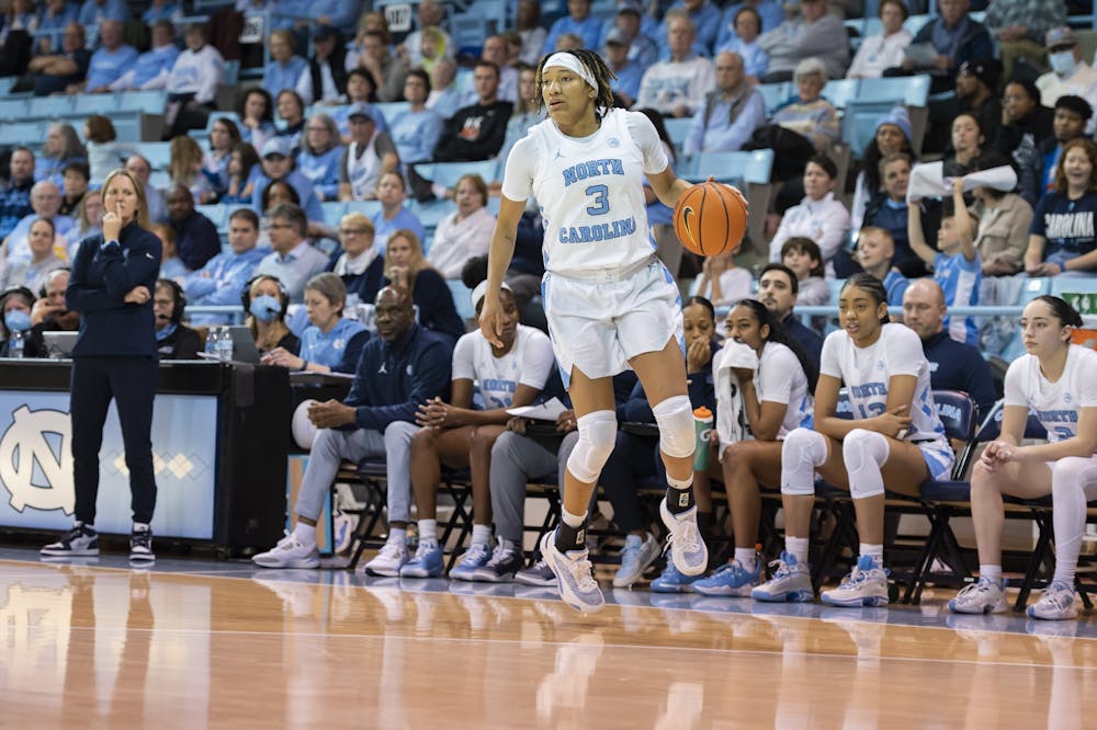 UNC junior guard Kennedy Todd-Williams (3) brings the ball up court during a basketball game against Georgia Tech on Sunday, Jan. 22, 2023, in Carmichael Arena. UNC won 70-57.