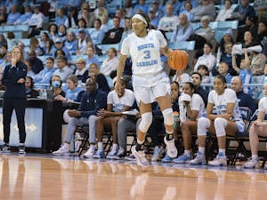UNC junior guard Kennedy Todd-Williams (3) brings the ball up court during a basketball game against Georgia Tech on Sunday, Jan. 22, 2023, in Carmichael Arena. UNC won 70-57.