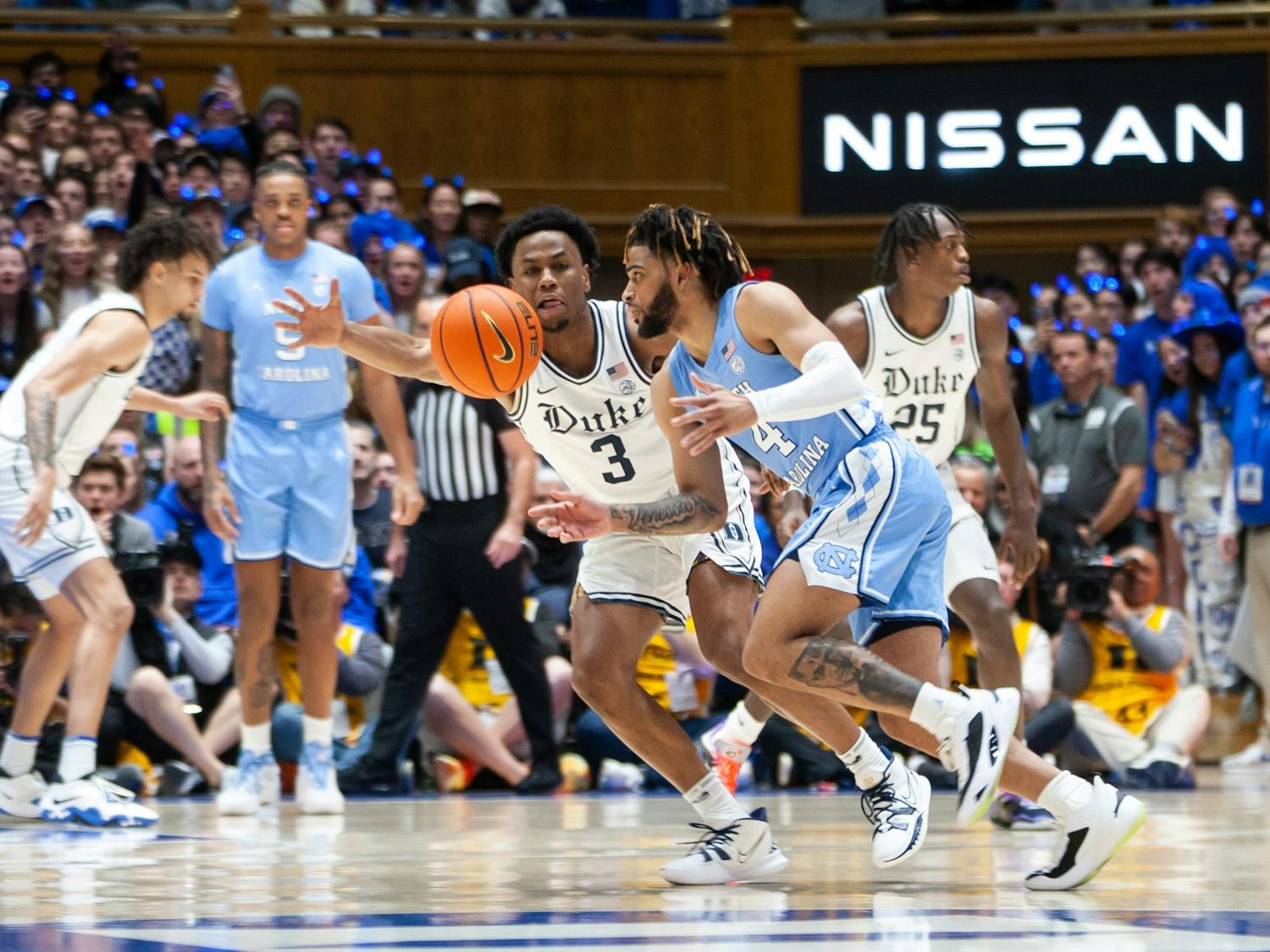 UNC junior guard RJ Davis (4) drives the ball to the basket during the men's basketball game against Duke on Feb. 4, 2023 at Cameron Indoor Stadium. UNC lost 63-57.