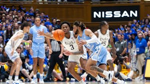 UNC junior guard RJ Davis (4) drives the ball to the basket during the men's basketball game against Duke on Feb. 4, 2023 at Cameron Indoor Stadium. UNC lost 63-57.