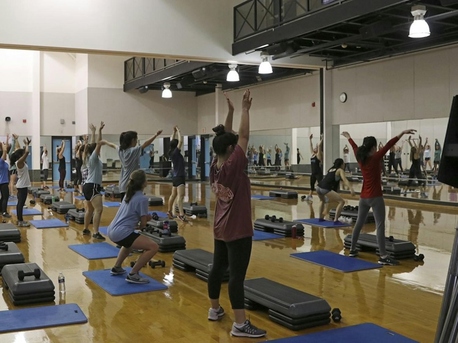 Students, faculty and employees participate in exercise classes in the Student Recreation Center on Jan. 24, 2017.