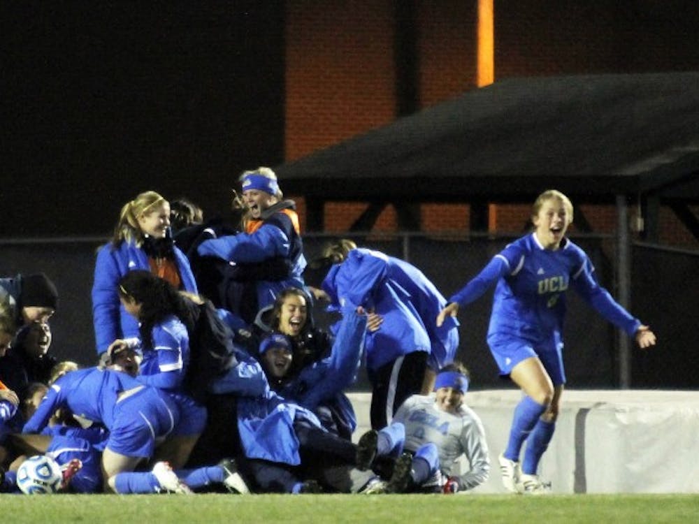 	UCLA women&#8217;s soccer celebrates after a second overtime victory over the Tar Heels. The Bruins won 1-0.