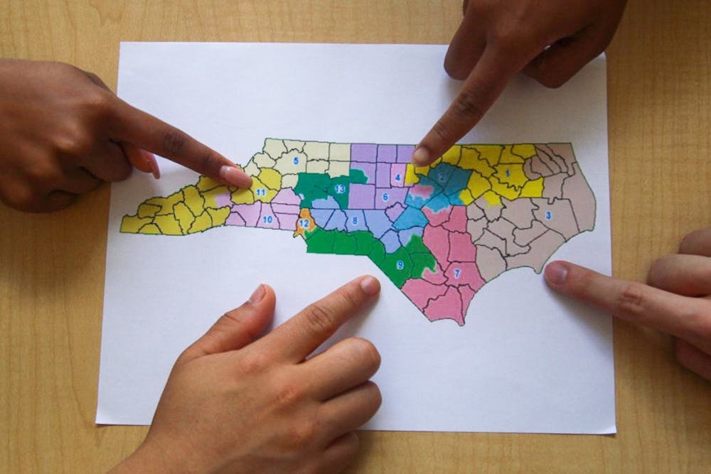 DTH Photo Illustration. NC judges order district lines to be redrawn ahead of the 2020 election in an attempt to limit gerrymandering.
