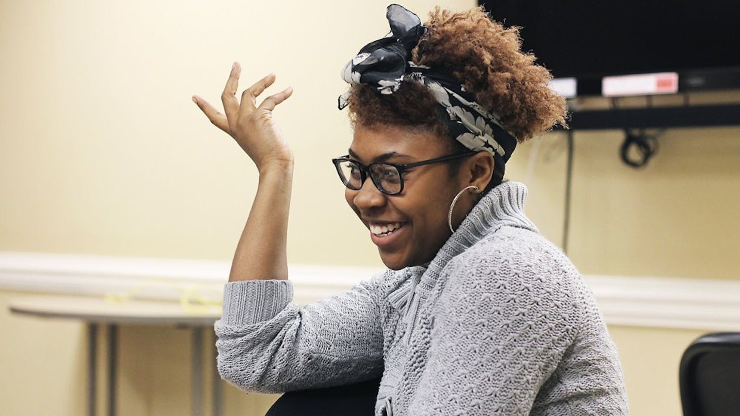 Cipryana Mack, a sophomore EXSS major, leads a discussion following a screening of the film "Dear White People" hosted by the UNC Black Student Movement at Ram Village on Friday.