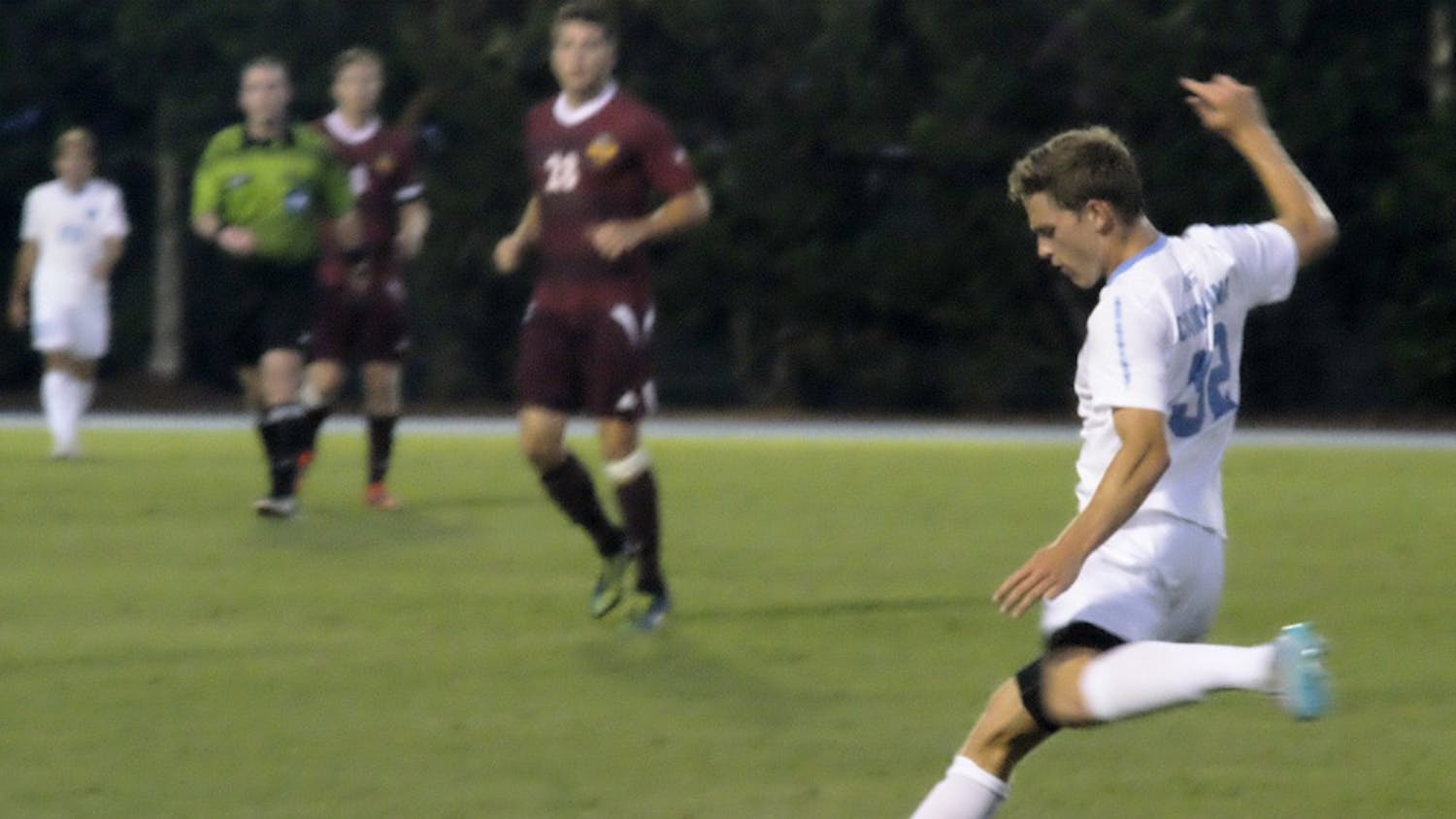 Luke Ciocca kicks the ball off to teammates during the Friday game against Winthrop.