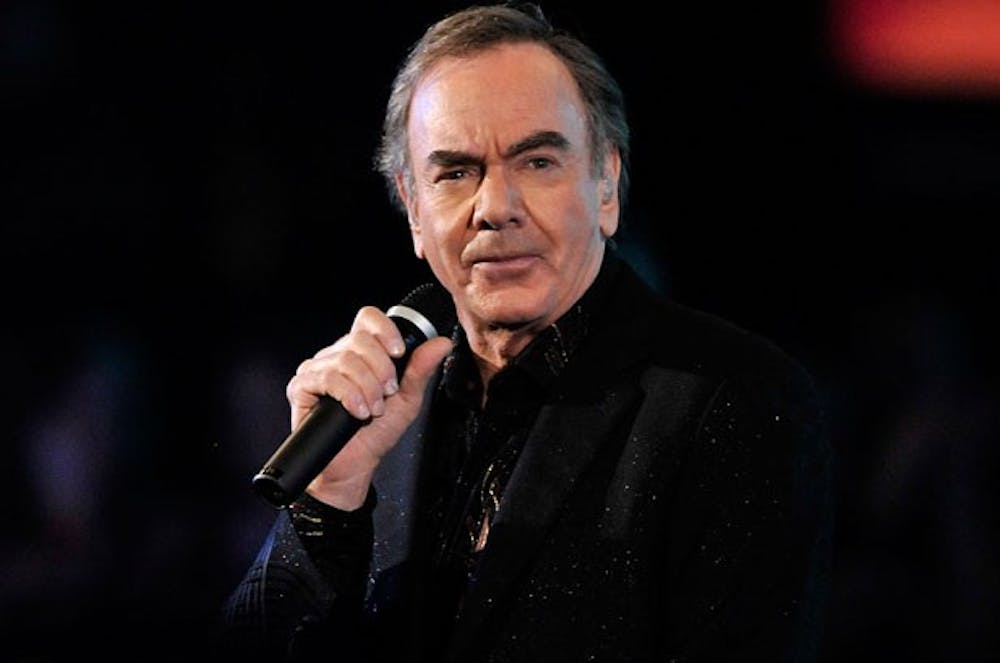 Neil Diamond delivers his signature brand of soft rock live and in person. Courtesy of  Legacy recordings