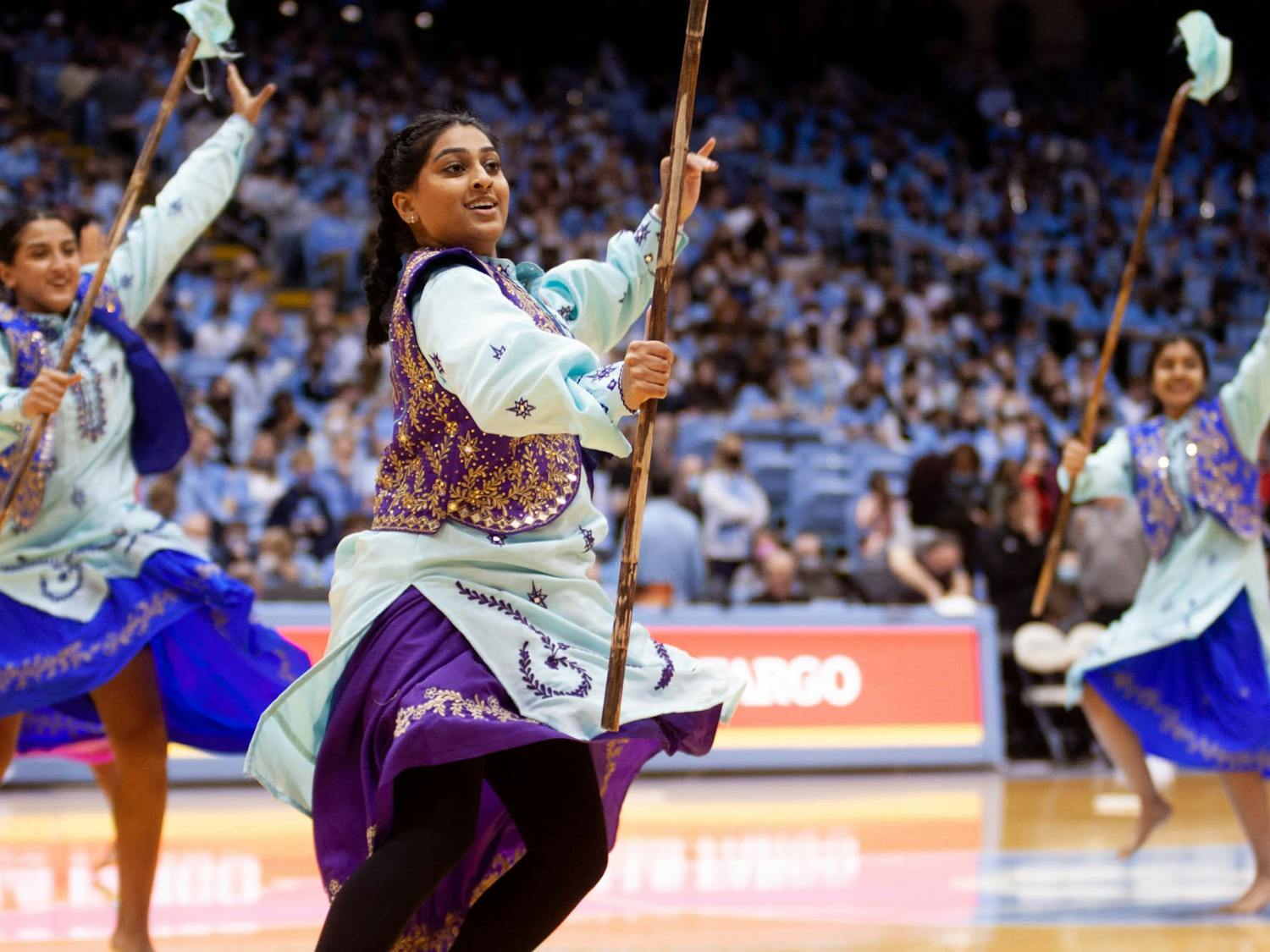 The Bhangra Elite dance team performs during halftime of a men's basketball game at the Dean Smith Center on Monday, Feb. 21, 2022.&nbsp;