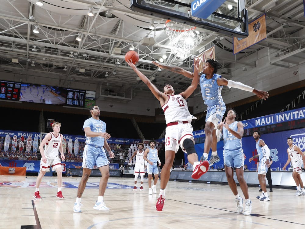 UNC first year guard Caleb Love (2) attempts to block a basket during a game against Stanford during the Maui Invitational Tournament in Asheville, N.C. on Tuesday, Dec. 1, 2020. UNC beat Stanford 67-63. Photo courtesy of Brian Spurlock/Camping World Maui Invitational.