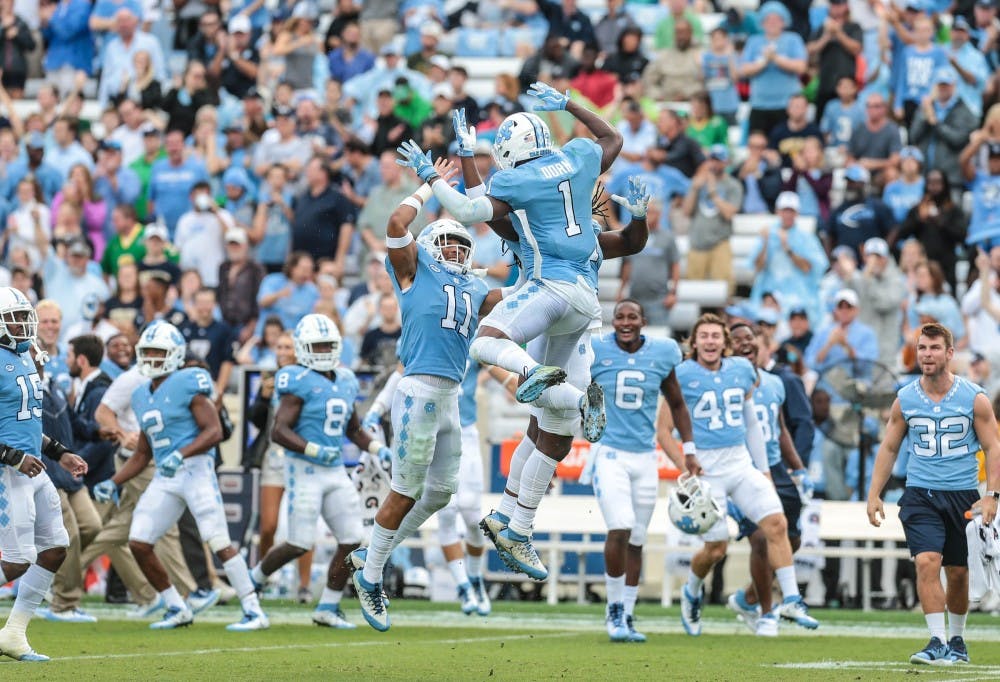 Myles Dorn celebrates