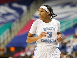 UNC sophomore guard Kennedy Todd-Williams (3) sprints to an offensive start during the quarterfinals of the ACC Women's Basketball Tournament against Virginia Tech at the Greensboro Coliseum. Virginia Tech won 87-80 in overtime.
