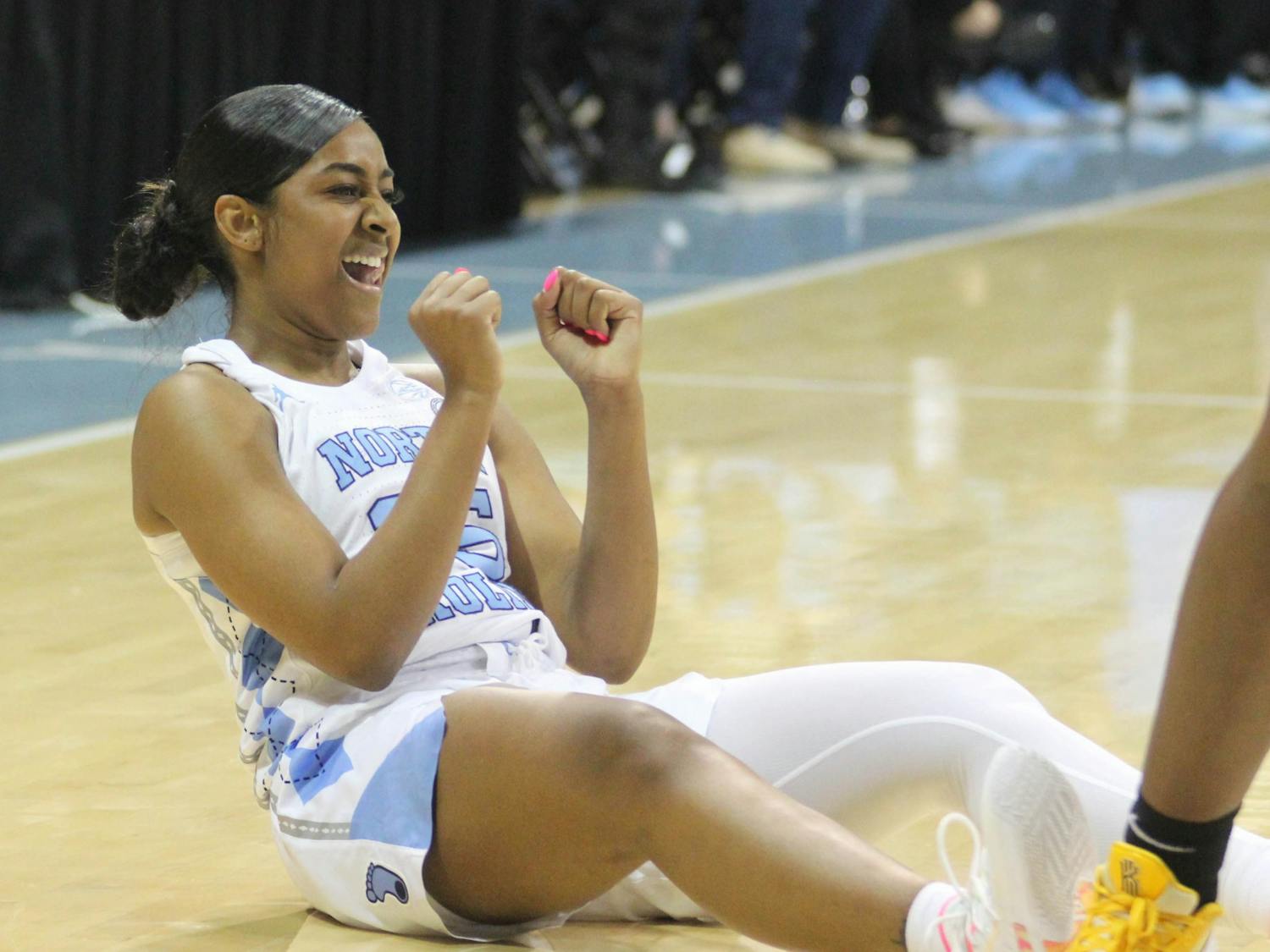 Sophomore guard Deja Kelly (25) celebrates at the game against App State on Nov. 17 at Carmichael Arena. UNC won 89-44 and Kelly finished the game with 18 points. 