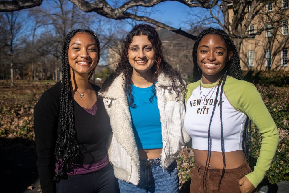 <p>UNC seniors Shelby Armstrong, Avni Singh and Nyla Guilford, pictured on Tuesday, Jan. 24, 2023, are three members of the large production team for the student film "Sticky Feet."</p>