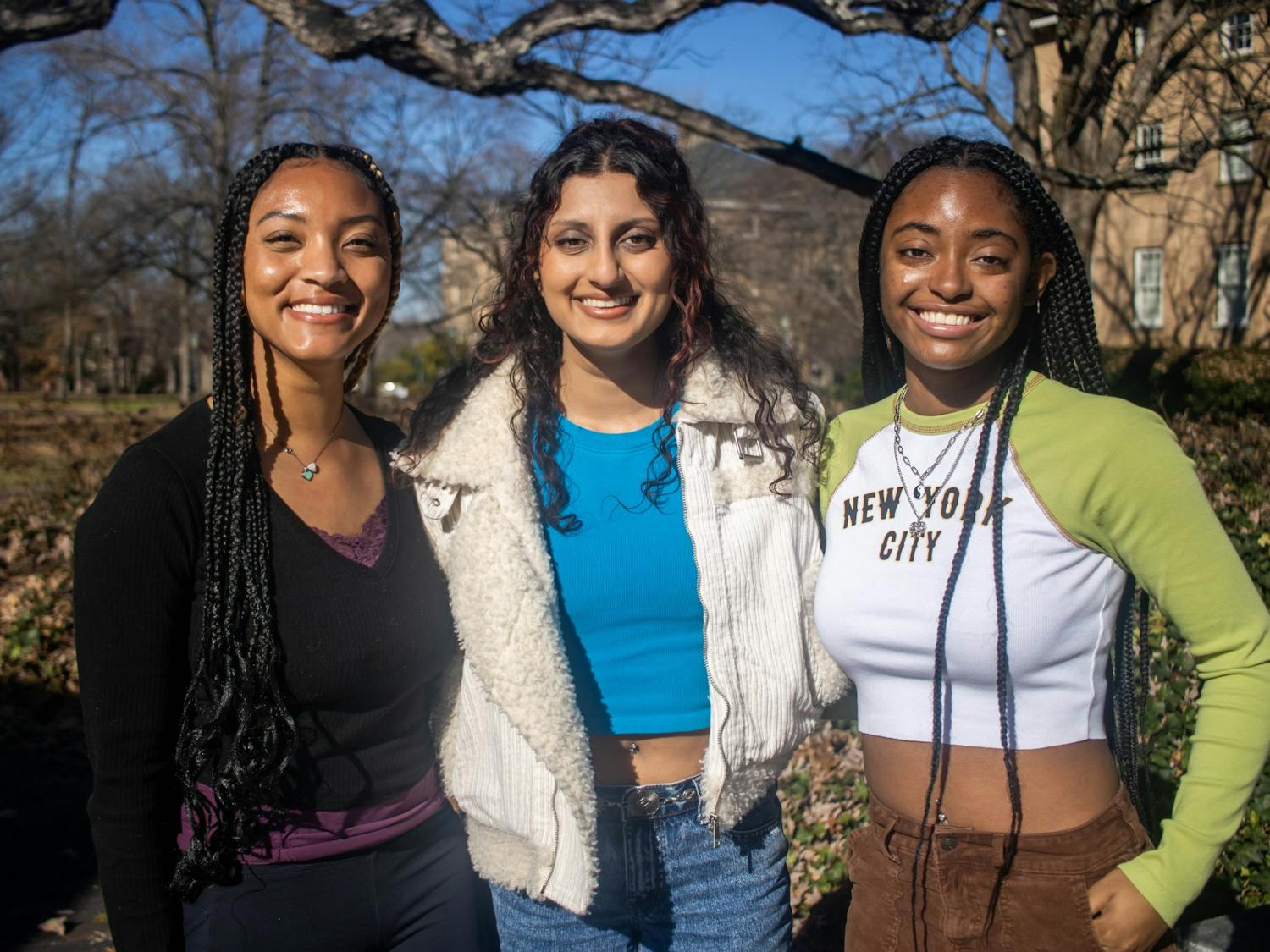 UNC seniors, Shelby Armstrong, Avni Singh, and Nyla Guilford, pose for a portrait on Tuesday, Jan. 24, 2023. They are the production team for the student film, Sticky Feet.