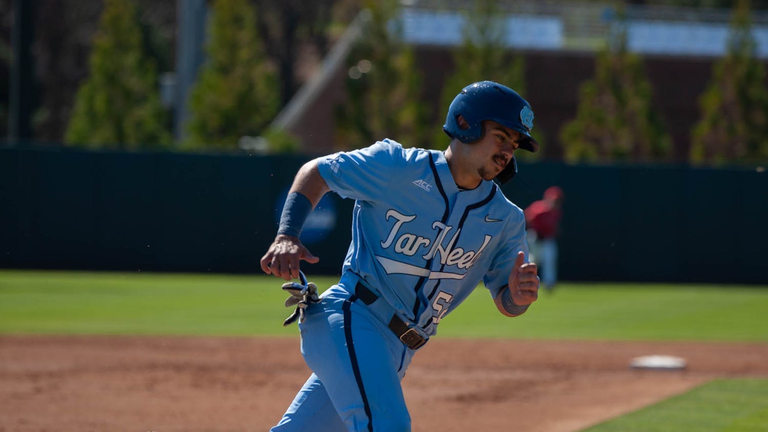 UNC Junior Tomas Frick runs home during UNC's baseball game against Queens on Tuesday, April 11, 2023. UNC won 10-6.