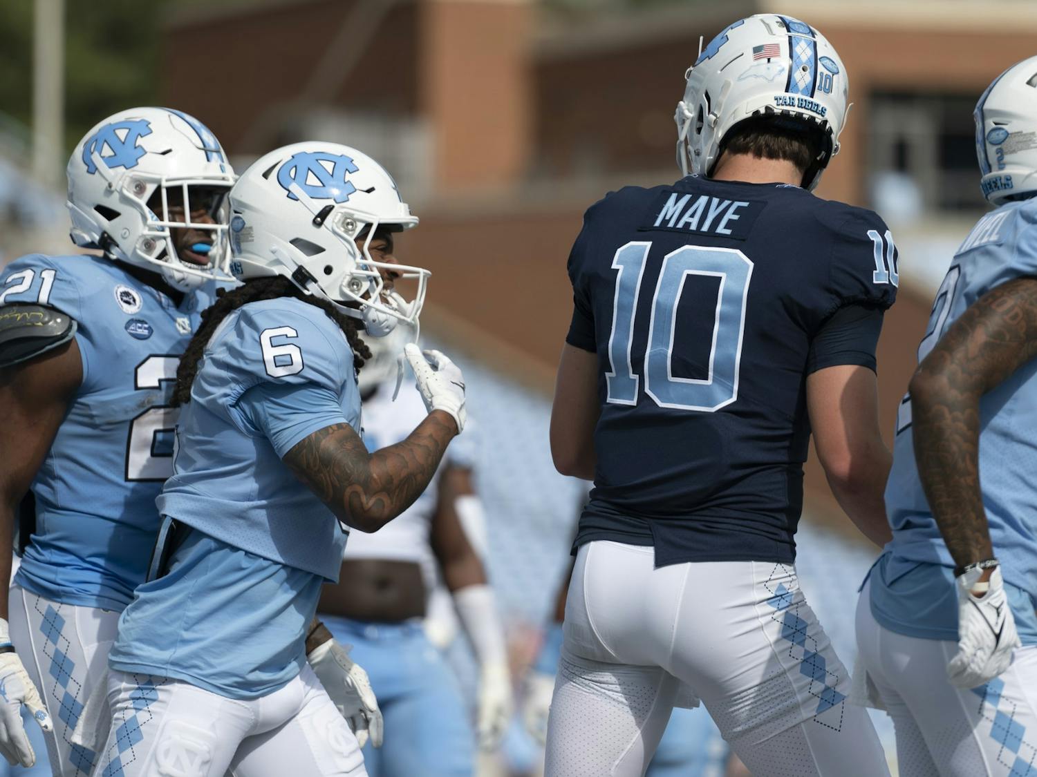 UNC junior wide receiver Nate McCollum (6) celebrates with UNC sophomore quarterback Drake Maye (10) after they scored a touchdown during the Spring Game in Kenan Stadium at on Saturday, April 15, 2023.