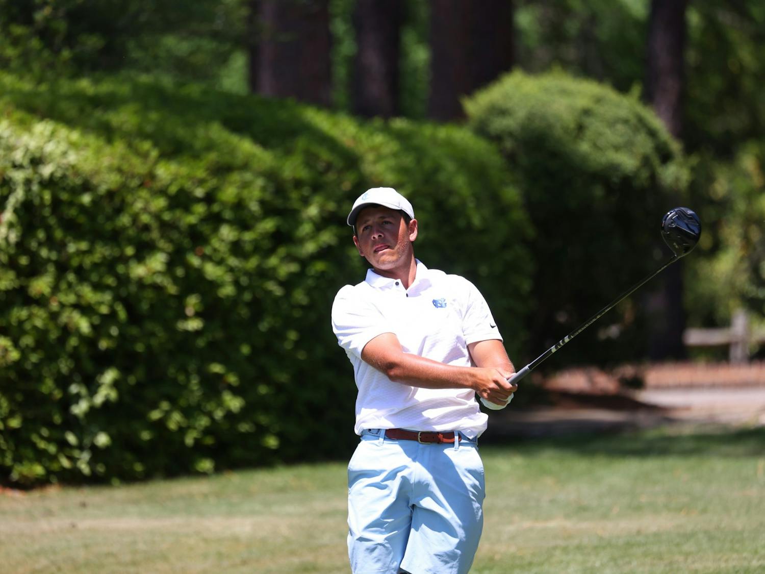 UNC senior Dylan Menante swings his golf club during the 2023 ACC Men’s Golf Championship at the Dogwood Course in Pinehurst, N.C. on April 21, 2023.
Photo Courtesy of Andy Mead/YCJ.