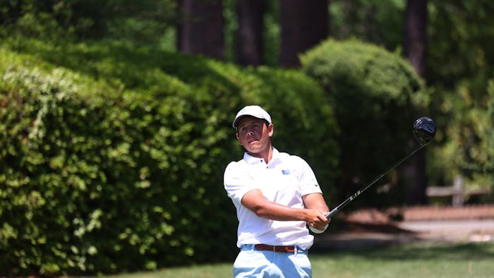 UNC senior Dylan Menante swings his golf club during the 2023 ACC Men’s Golf Championship at the Dogwood Course in Pinehurst, N.C. on April 21, 2023.
Photo Courtesy of Andy Mead/YCJ.