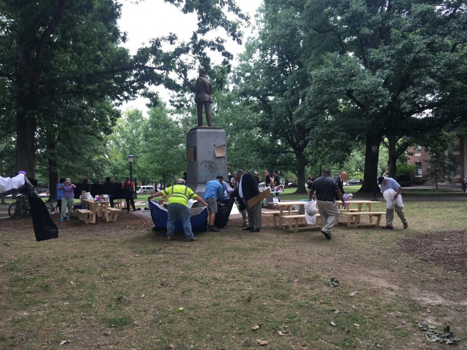 Signs and belongings were removed Thursday morning from around Silent Sam.&nbsp;