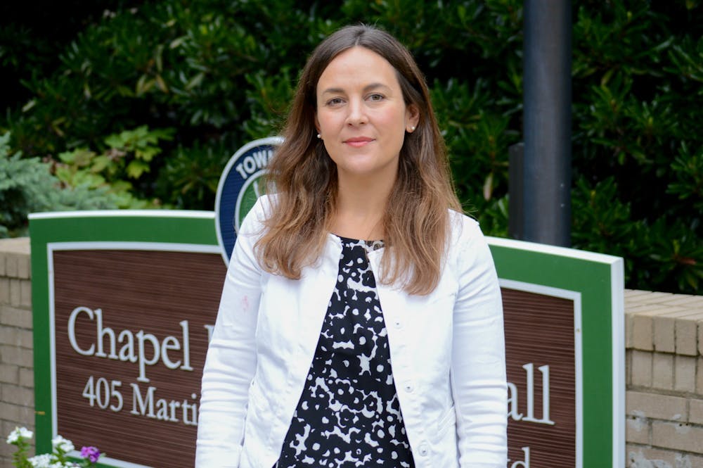 Sarah Viñas, Director of Chapel Hill Afforable Housing, poses outside of Chapel Hill Town Hall on Aug. 16, 2022.