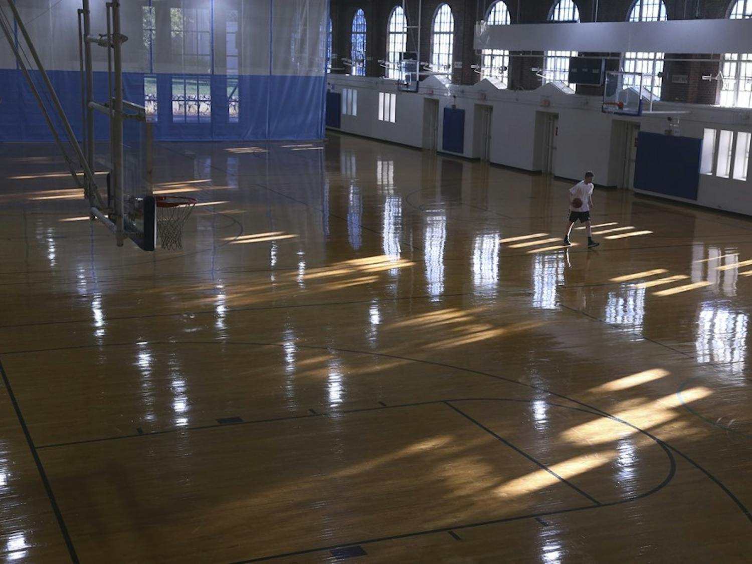 Basketball players frequent Woolen Gym for pickup games.