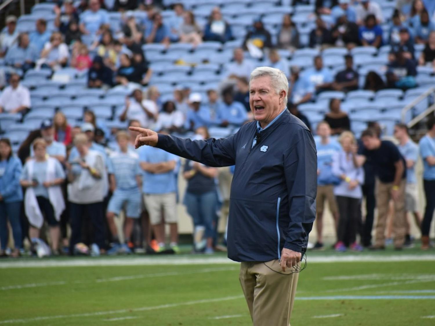 UNC football coach Mack Brown observes his team during the Spring Football Game on April 13, 2019 in Kenan Stadium. The Carolina team defeated the Tar Heel team 25-10.