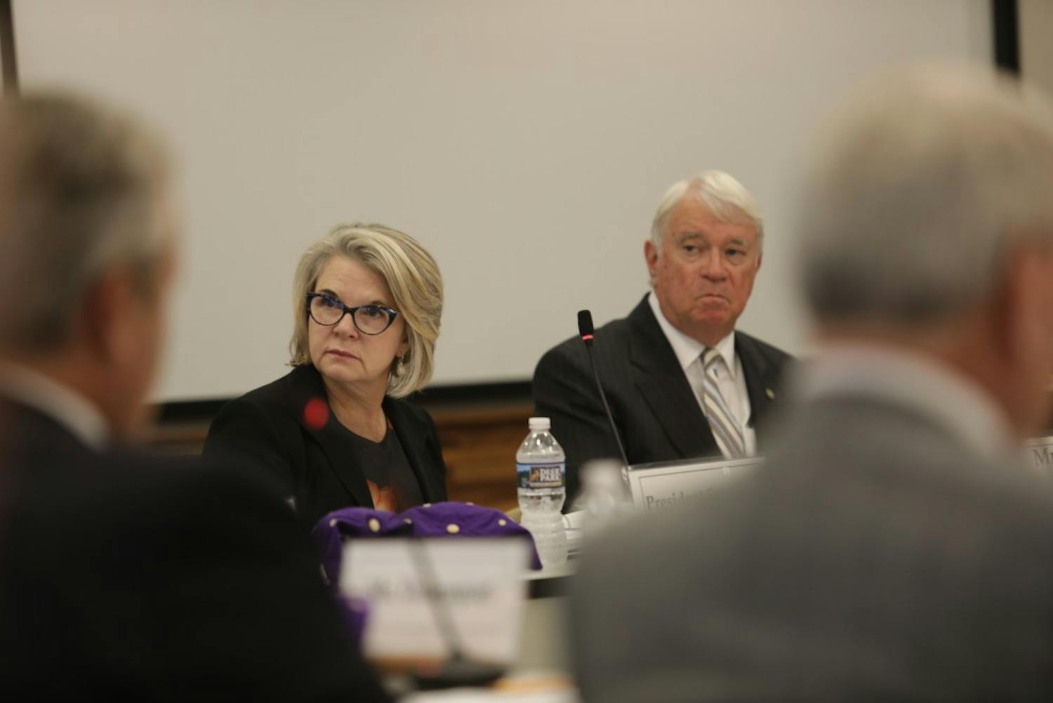 UNC-system President Margaret Spellings (left) sits next to chairperson Lou Bissette (right) during a September 2017 UNC Board of Governors meeting.
