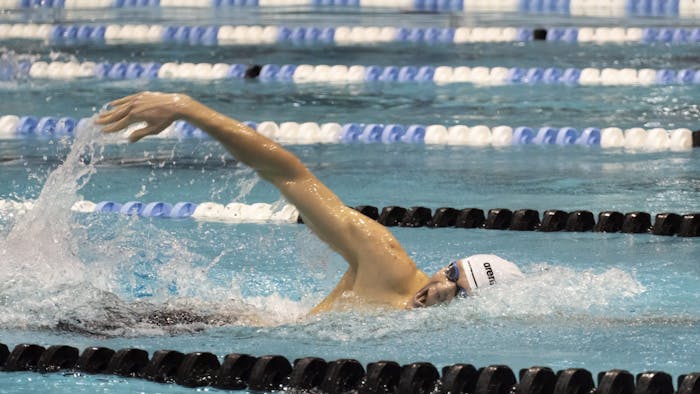 UNC first-year swimmer Louis Dramm competing in the men's 200 freestyle relay against Duke at Koury Natatorium on Friday, Jan. 28, 2023. UNC beat Duke 156-44.