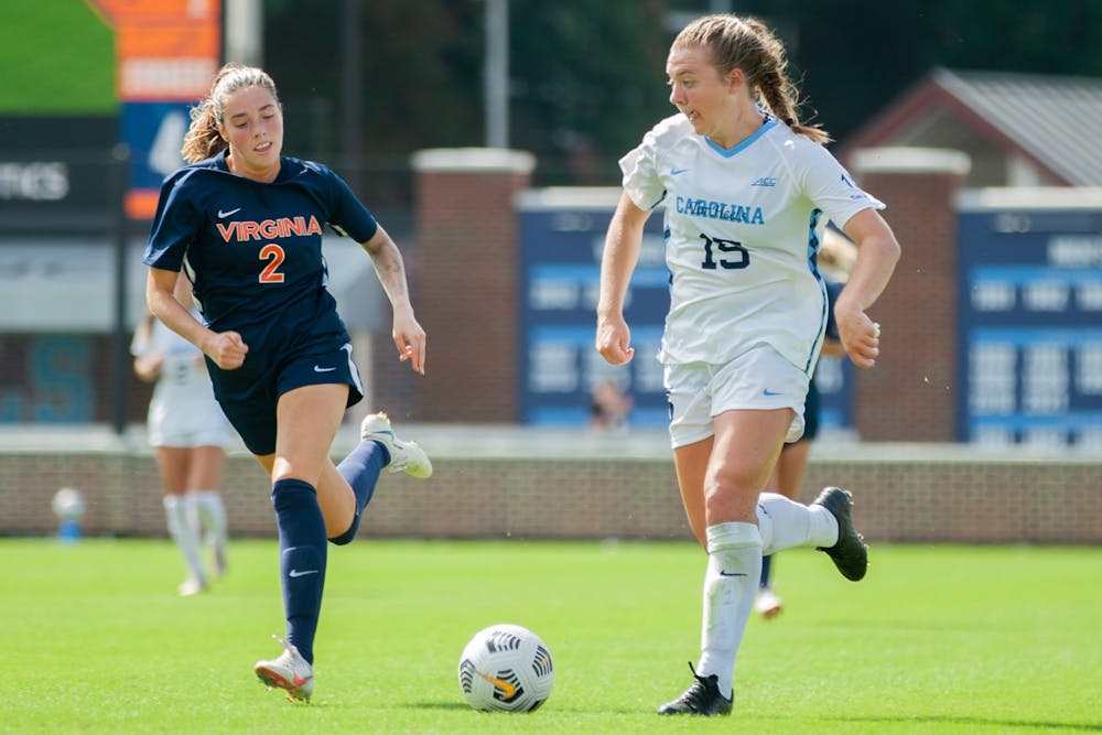 Sophomore forward/midfielder Avery Patterson (15) dribbles the ball at the game against Virginia on Oct. 3 at Dorrance Field. UNC tied 0-0.