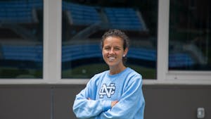 Caitlin Van Sickle, assistant coach for UNC field hockey, poses for a portrait at Karen Shelton Stadium on July 5, 2022.