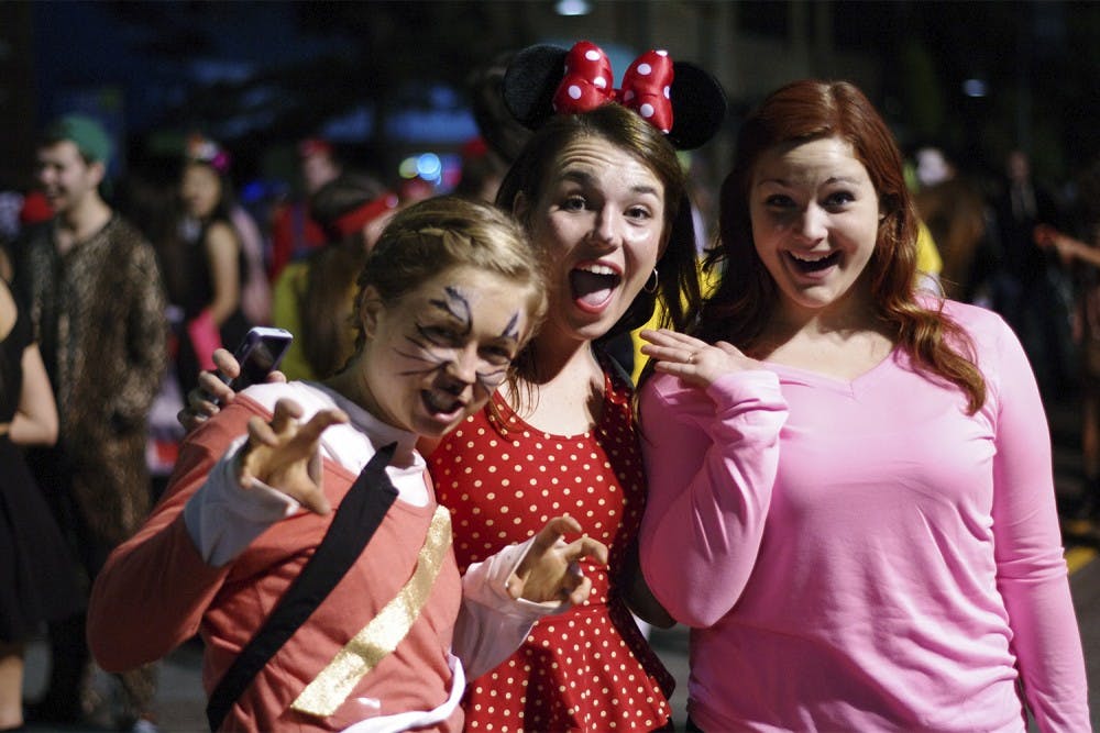 Lily Clark dresses as Tiger Lilly, Maggie Blank dresses as Minnie Mouse, and Shelby Miller  dresses as the imogi girl .