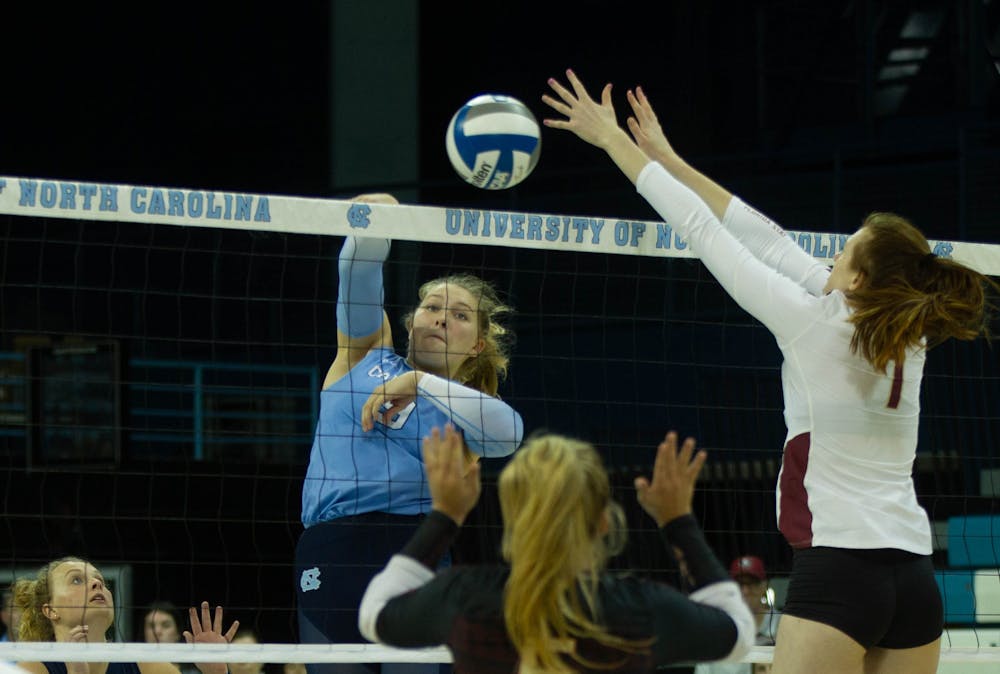 UNC sophomore outside hitter Mabrey Shaffmaster (9) spikes the ball during the game against Florida State on Oct. 2, 2022. UNC lost to Florida State 2-3.