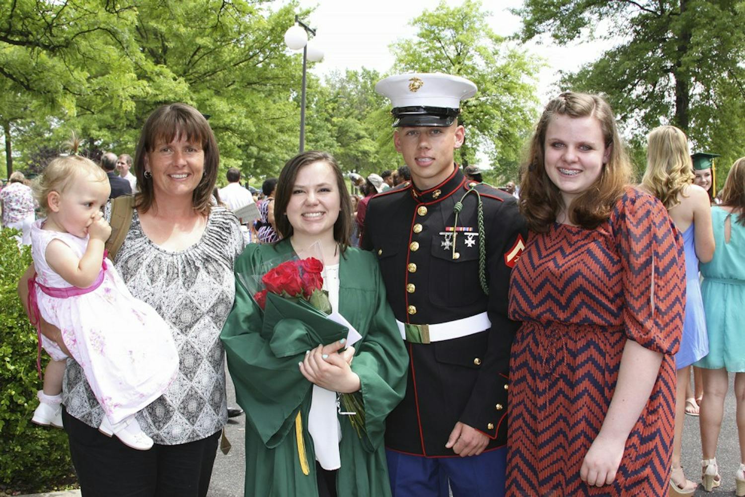 Patti Coyne Powell (second from left), who was diagnosed with cancer, and her children celebrate her daughter’s graduation. Courtesy of Patti Coyne Powell 