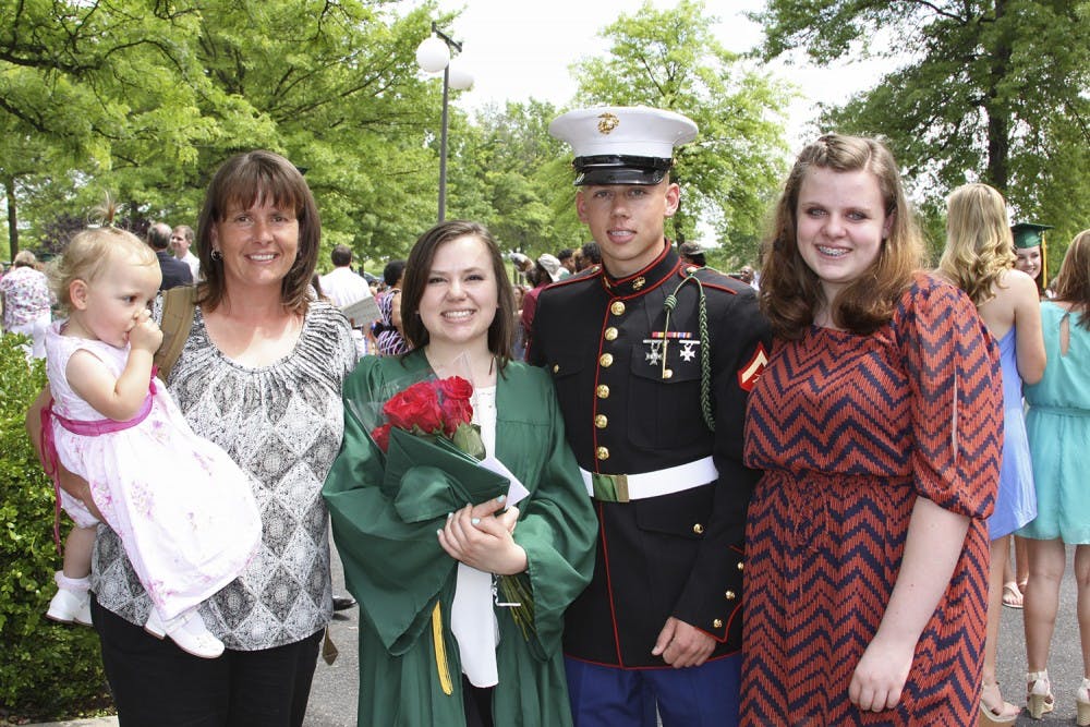 <p>Patti Coyne Powell (second from left), who was diagnosed with cancer, and her children celebrate her daughter’s graduation.</p><p> Courtesy of Patti Coyne Powell </p>