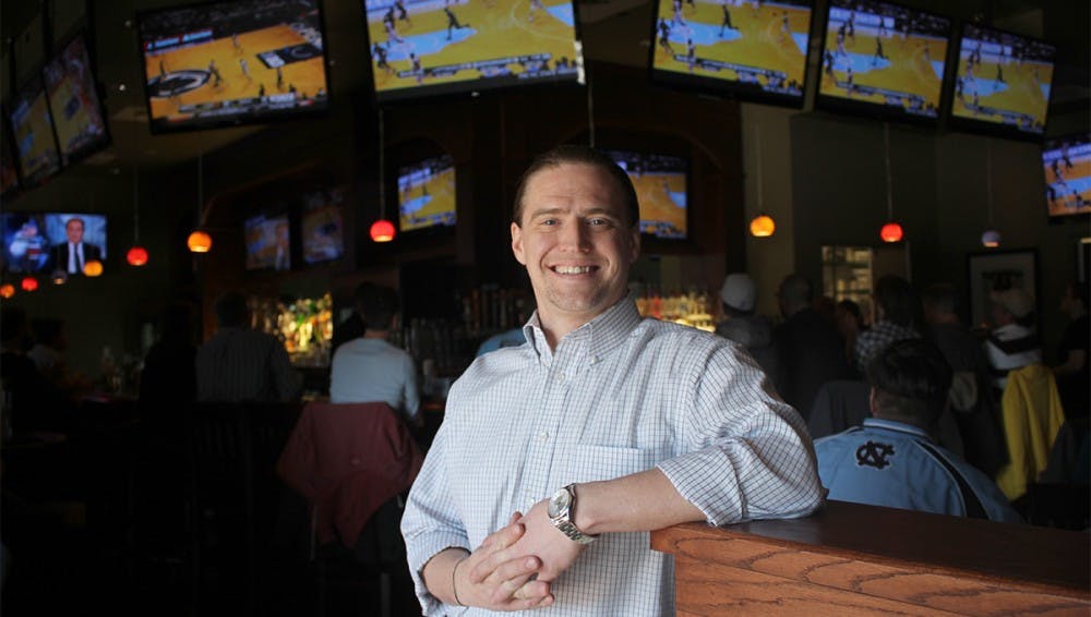 Brent Walls, a UNC alum, is the general manager of Hickory Tavern, a new restaurant in Carrboro. "I've been to 24 different countries, all across the world, and this is the place to be."