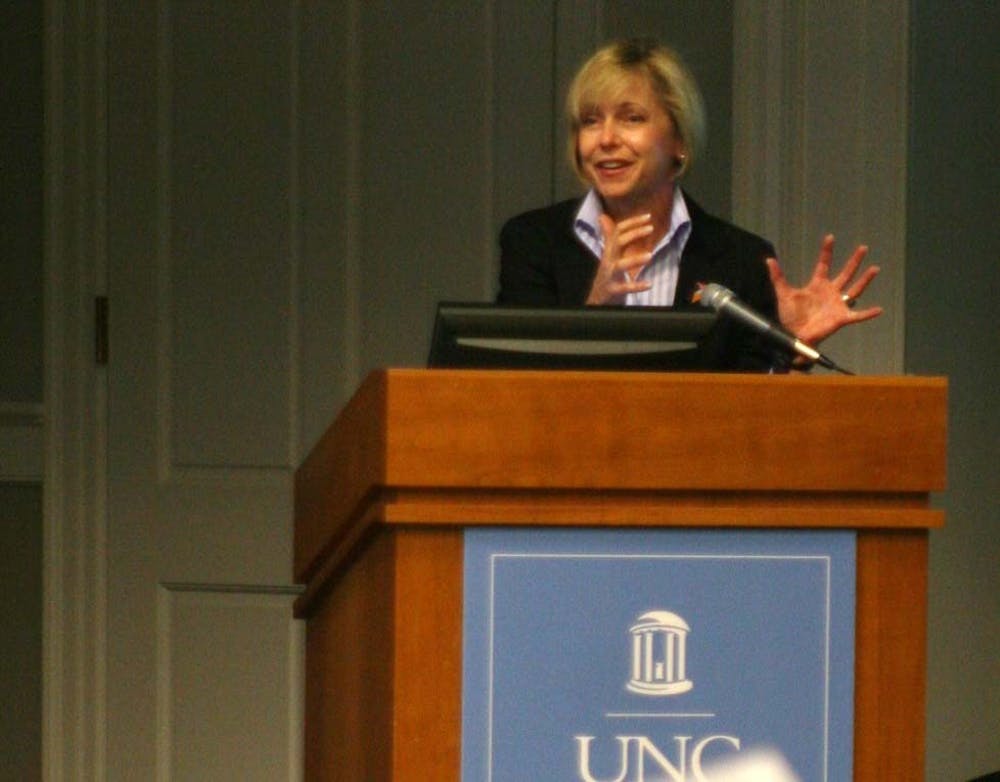 Patti Thorp talks at the Employee Forum on Nov. 3 about UNC Habitat for Humanity’s Build a Block program. When building is complete, 33 UNC families will get a new home, 24 of which will be in Phoenix Place.