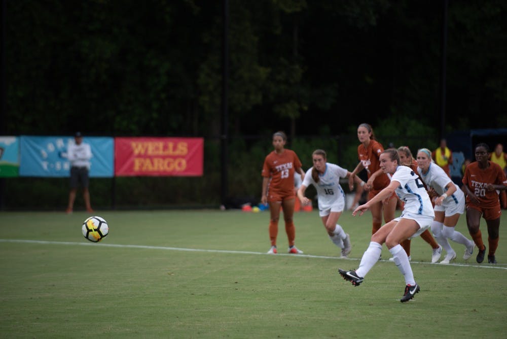 UNC senior midfielder Dorian Bailey (29) shoots a penalty kick against No. 21 Texas in the first half of the team's 1-1 tie on Aug. 22 at Finley Field South.