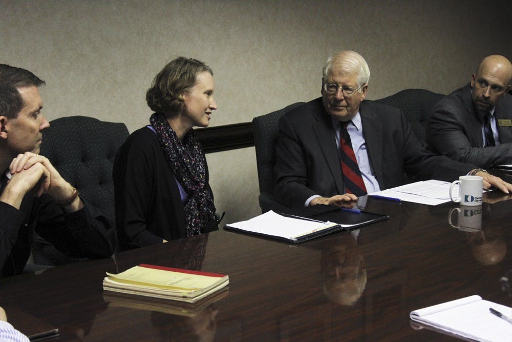 Congressman David Price-D (right) visited the Center for Developmental Science Tuesday afternoon. Andrea Hussong, the center's director, gave Price a tour and hosted a meeting to discuss federal funding for research programs.
