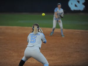 Junior Campbell Hutcherson, number 5, prepares to catch the ball at the UNC softball match against Liberty University on Wednesday, April 10, 2019 at the Anderson Softball Stadium. UNC won 3-2.