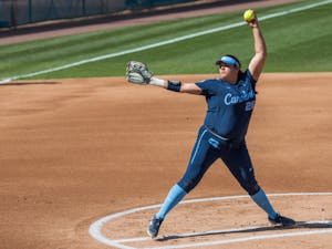 UNC junior pitcher Brittany Pickett (28) winds up for a pitch during a double header against the FSU Seminoles at G. Anderson Softball Stadium on Monday, April 15, 2019. The Tar Heels beat the Seminoles in both games.
