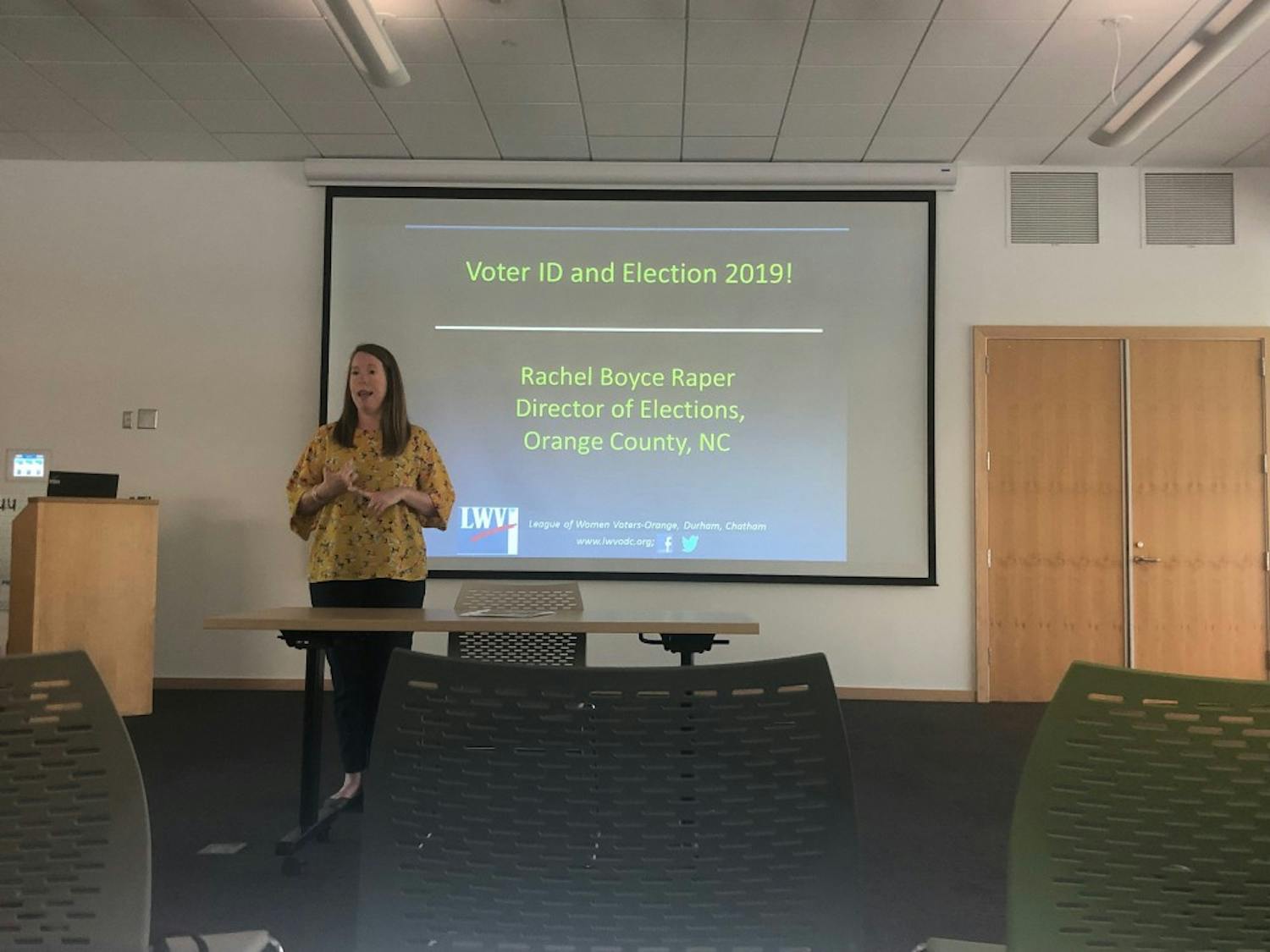 Rachel Raper, director of the Orange County Board of Elections, gives a presentation at the Chapel Hill Public Library on April 24 to educate county residents about the new voter ID law.