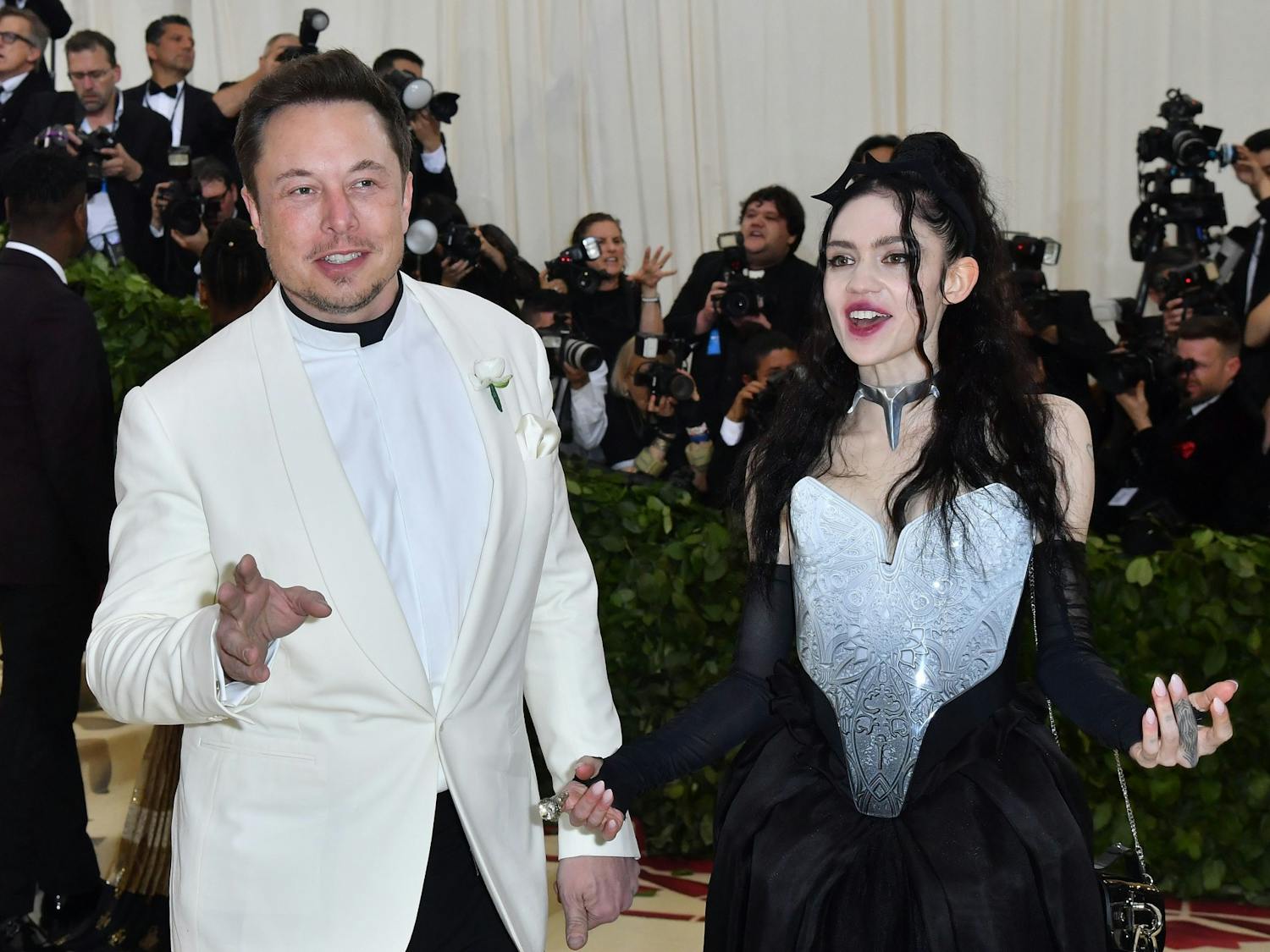 Elon Musk and Grimes arrive for the 2018 Met Gala on May 7, 2018, at the Metropolitan Museum of Art in New York. Photo courtesy of Angela Weiss/AFP via Getty Images/TNS.