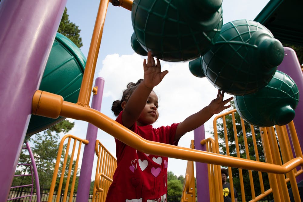 Marsaline Judd plays on the playground at Southern Community Park on July 6, 2022.