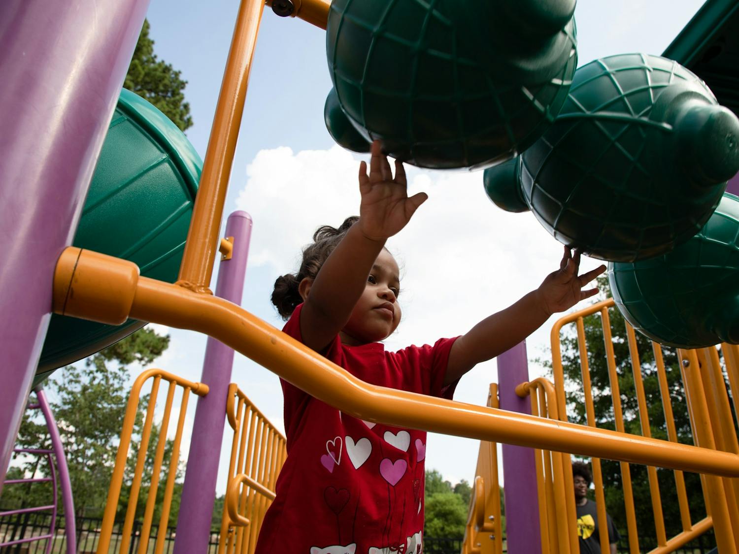 Marsaline Judd plays on the playground at Southern Community Park on July 6, 2022.