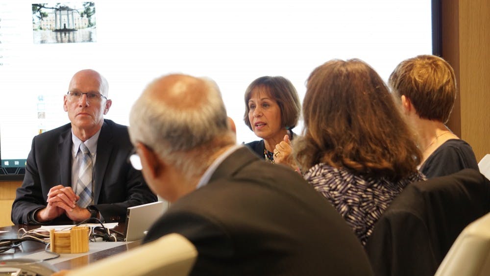 Provost Bob Blouin (left) and Chancellor Carol Folt (right) discuss matters relating to the Confederate monument, Silent Sam, during an executive committee meeting on Monday.