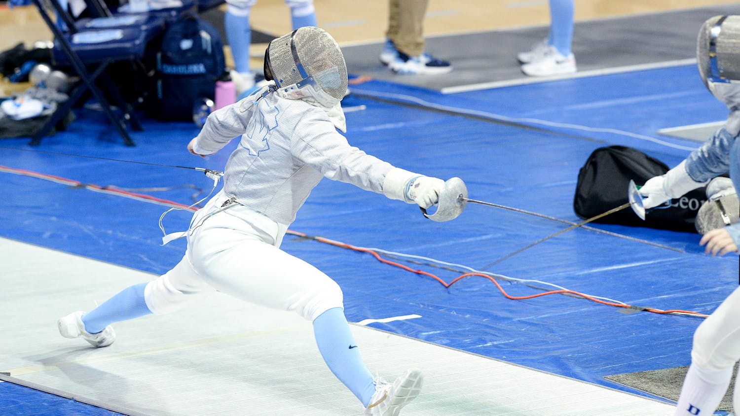 sports-womens-fencing-check-in-contrib